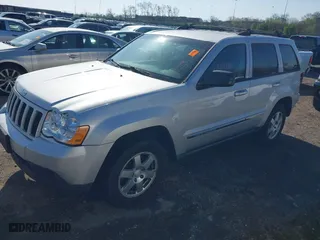 2010 Jeep Grand Cherokee Laredo with VIN 1J4PR4GK5AC161442, listed as a IAAI auction lot 41939994 with 137,376 mi miles. Bid and sale history available at carsss.com. Image 2.