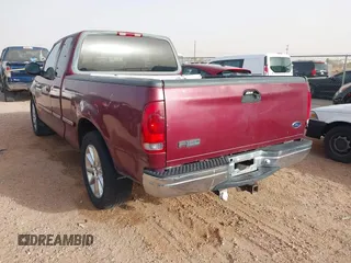 1998 Ford F-150 with VIN 1FTZX17WXWKB63416, listed as a IAAI auction lot 41604048 with 214,890 mi miles and . Bid and sale history available at DreamBid. Image 3.