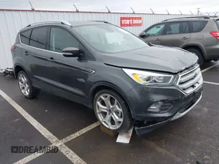2019 Ford Escape Titanium with VIN 1FMCU9J99KUA64158, listed as a IAAI auction lot 41980102 with 52,514 mi miles. Bid and sale history available at carsss.com. Image 1.