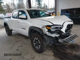 2023 Toyota Tacoma SR5 z VIN 3TMDZ5BN1PM158884, wystawiony jako IAAI lot #41424159 z przebiegiem 26 111 mil mil oraz . Historia ofert i sprzedaży dostępna na DreamBid. Obrazek 1.