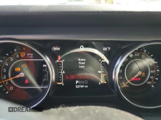 2021 Jeep Wrangler Unlimited Willys with VIN 1C4HJXDG8MW650763, listed as a Copart auction lot 59515805 with 52,749 mi miles and Salvage title. Bid and sale history available at DreamBid. Image 9.