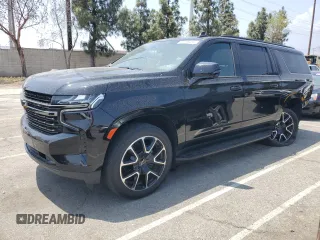 2022 Chevrolet Suburban RST with VIN 1GNSCEKD5NR207913, listed as a Copart auction lot 59799495 with 87,764 mi miles and Salvage title. Bid and sale history available at DreamBid. Image 1.