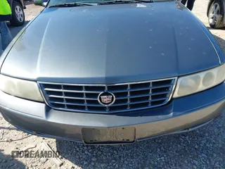 2003 Cadillac Seville Luxury SLS z VIN 1G6KS54Y43U158390, wystawiony jako IAAI lot #41977830 z przebiegiem 299 000 mil mil oraz . Historia ofert i sprzedaży dostępna na DreamBid. Obrazek 6.