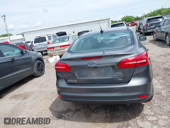 2018 Ford Focus SE with VIN 1FADP3F20JL312395, listed as a IAAI auction lot 42110335 with 110,720 mi miles and . Bid and sale history available at DreamBid. Image 16.