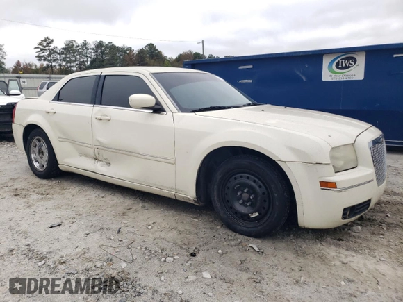 2006 Chrysler 300 Touring with VIN 2C3KA53GX6H343161, listed as a Copart auction lot 79411124 with 213,944 mi miles and Salvage Title. Bid and sale history available at carsss.com. Image 4.