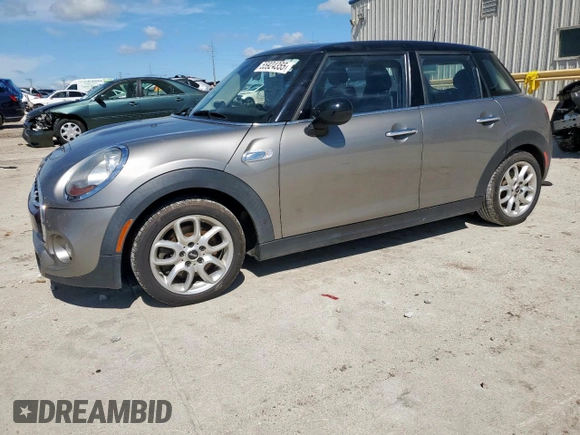 2018 MINI Hardtop 4 Door Cooper S with VIN WMWXU3C50J2F50669, listed as a Copart auction lot 55924355 with 64,702 mi miles and Salvage title. Bid and sale history available at DreamBid. Image 1.