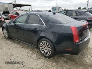 2010 Cadillac CTS z VIN 1G6DK5EG2A0128548, wystawiony jako Copart lot #55623815 z przebiegiem Nie podano mil oraz Szkoda całkowita • Salvage title. Historia ofert i sprzedaży dostępna na DreamBid. Obrazek 2.
