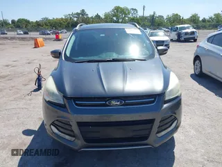 2016 Ford Escape Titanium with VIN 1FMCU0J95GUB11995, listed as a IAAI auction lot 42065255 with 142,390 mi miles. Bid and sale history available at carsss.com. Image 12.