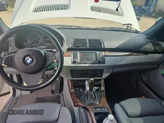 2006 BMW X5 4.4i with VIN 5UXFB53556LV26283, listed as a Copart auction lot 79714584 with 77,033 mi miles and Clean Title. Bid and sale history available at carsss.com. Image 9.