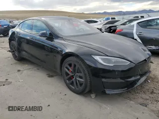 2024 Tesla Model S Plaid z VIN 5YJSA1E65RF543822, wystawiony jako Copart lot #48545205 z przebiegiem 2 473 mil mil oraz Szkoda całkowita • Salvage title. Historia ofert i sprzedaży dostępna na DreamBid. Obrazek 4.