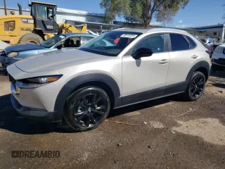 2022 Mazda CX-30 2.5 Turbo with VIN 3MVDMBAY1NM447753, listed as a Copart auction lot 68148334 with 5,180 mi miles and Salvage Title. Bid and sale history available at carsss.com. Image 1.