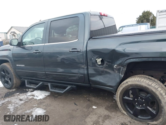 2017 GMC Sierra 1500 SLE with VIN 3GTU2MEC6HG319366, listed as a IAAI auction lot 41351311 with 123,097 mi miles and . Bid and sale history available at DreamBid. Image 14.