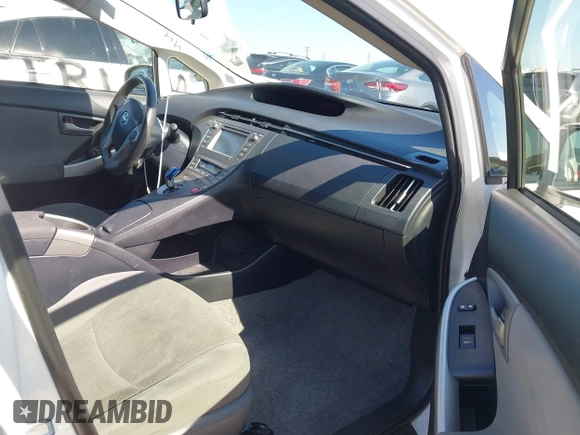 2015 Toyota Prius Four with VIN JTDKN3DU4F1977363, listed as a IAAI auction lot 42283570 with 185,992 mi miles and . Bid and sale history available at DreamBid. Image 5.