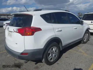 2014 Toyota RAV4 LE with VIN 2T3ZFREV6EW079675, listed as a IAAI auction lot 41893612 with 163,399 mi miles. Bid and sale history available at carsss.com. Image 4.