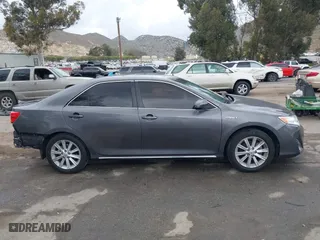 2013 Toyota Camry Hybrid LE with VIN 4T1BD1FK1DU091687, listed as a IAAI auction lot 42046450 with 211,895 mi miles. Bid and sale history available at carsss.com. Image 14.