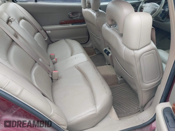 2001 Buick LeSabre Limited z VIN 1G4HR54K41U100044, wystawiony jako IAAI lot #42215795 z przebiegiem 125 144 mil mil oraz . Historia ofert i sprzedaży dostępna na DreamBid. Obrazek 8.