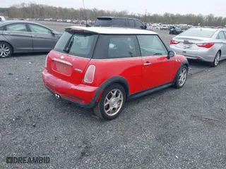 2005 MINI Cooper Hardtop S with VIN WMWRE33535TL15394, listed as a IAAI auction lot 42007067 with 154,746 mi miles. Bid and sale history available at carsss.com. Image 4.