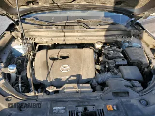 2020 Mazda CX-5 Touring with VIN JM3KFBCM9L0737243, listed as a Copart auction lot 46908495 with 76,956 mi miles and Salvage Title. Bid and sale history available at carsss.com. Image 12.
