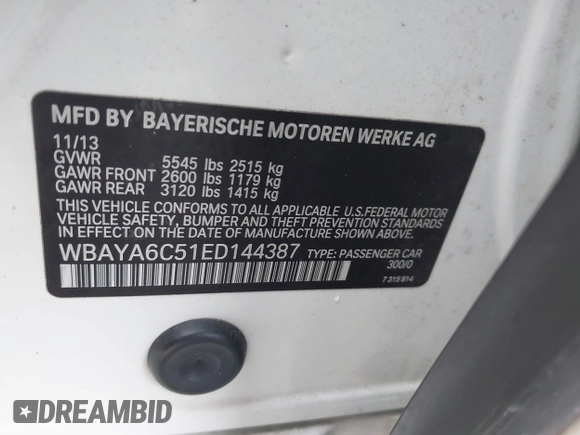 2014 BMW 7 Series 740i with VIN WBAYA6C51ED144387, listed as a IAAI auction lot 41226638 with 161,448 mi miles. Bid and sale history available at carsss.com. Image 9.
