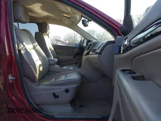 2012 Jeep Grand Cherokee Laredo with VIN 1C4RJFAG3CC163764, listed as a IAAI auction lot 41719137 with 198,827 mi miles. Bid and sale history available at carsss.com. Image 5.