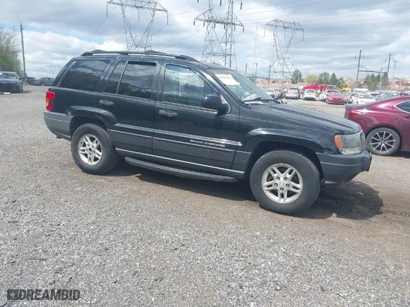 2003 Jeep Grand Cherokee Laredo with VIN 1J8GW48S63C596866, listed as a IAAI auction lot 42060430 with 129,849 mi miles. Bid and sale history available at carsss.com. Image 1.