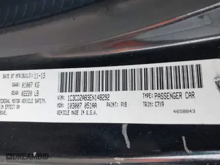 2014 Dodge Avenger SE with VIN 1C3CDZAB3EN148292, listed as a IAAI auction lot 42043642 with 134,676 mi miles. Bid and sale history available at carsss.com. Image 9.
