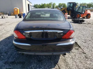 2002 Jaguar X-Type z VIN SAJEA51C92WC28396, wystawiony jako Copart lot #54454905 z przebiegiem 145 694 mil mil oraz Szkody całkowita. Historia ofert i sprzedaży dostępna na DreamBid. Obrazek 6.