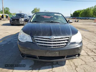 2008 Chrysler Sebring Touring z VIN 1C3LC55R38N176522, wystawiony jako Copart lot #57062395 z przebiegiem 151 843 mil mil oraz Szkoda całkowita • Salvage title. Historia ofert i sprzedaży dostępna na DreamBid. Obrazek 5.