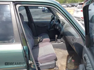 1999 Toyota RAV4 with VIN JT3GP10V4X7052720, listed as a IAAI auction lot 42490948 with 321,165 mi miles and . Bid and sale history available at DreamBid. Image 5.