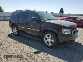 2010 Chevrolet Tahoe LTZ with VIN 1GNUKCE08AR117979, listed as a Copart auction lot 64802225 with 228,769 mi miles and Salvage title. Bid and sale history available at DreamBid. Image 4.