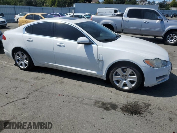 2011 Jaguar XF with VIN SAJWA0FB6BLR86959, listed as a Copart auction lot 52579385 with 110,087 mi miles and Salvage Title. Bid and sale history available at carsss.com. Image 4.