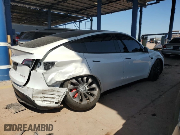 2021 Tesla Model Y Performance z VIN 5YJYGDEF5MF215870, wystawiony jako Copart lot #52531015 z przebiegiem 21 904 mil mil oraz Szkoda całkowita • Salvage title. Historia ofert i sprzedaży dostępna na DreamBid. Obrazek 3.