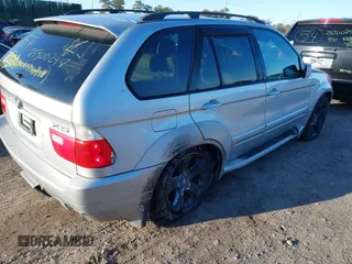 2001 BMW X5 4.4i with VIN WBAFB33511LH07282, listed as a IAAI auction lot 41766599 with 999,999 mi miles. Bid and sale history available at carsss.com. Image 4.