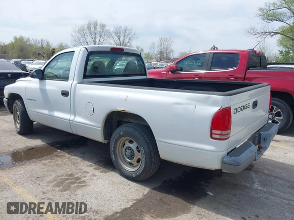 2001 Dodge Dakota with VIN 1B7FL26XX1S249462, listed as a IAAI auction lot 42003993 with 228,398 mi miles. Bid and sale history available at carsss.com. Image 3.
