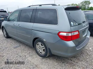 2005 Honda Odyssey EX-L z VIN 5FNRL386X5B038143, wystawiony jako IAAI lot #42149398 z przebiegiem 243 002 mil mil oraz . Historia ofert i sprzedaży dostępna na DreamBid. Obrazek 3.