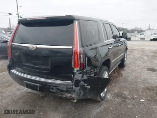 2017 Cadillac Escalade Platinum with VIN 1GYS4DKJ4HR337718, listed as a IAAI auction lot 41229425 with 94,121 mi miles. Bid and sale history available at carsss.com. Image 4.