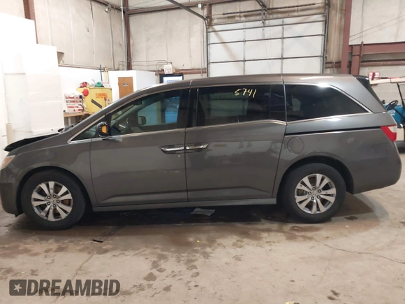 2011 Honda Odyssey Touring Elite with VIN 5FNRL5H96BB030946, listed as a IAAI auction lot 41465741 with 122,678 mi miles and . Bid and sale history available at DreamBid. Image 14.