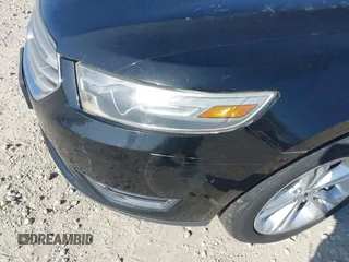 2013 Ford Taurus SEL with VIN 1FAHP2E96DG148836, listed as a IAAI auction lot 42030387 with 192,218 mi miles and . Bid and sale history available at carsss.com. Image 13.