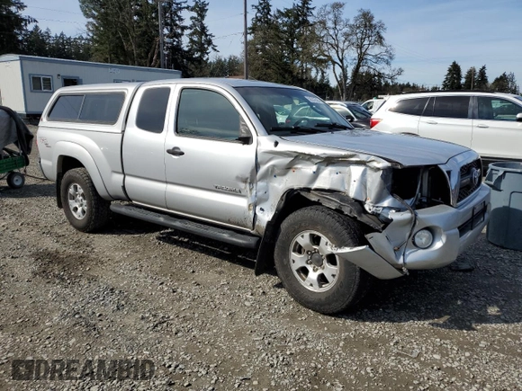 2011 Toyota Tacoma with VIN 5TFUU4EN7BX021987, listed as a Copart auction lot 50532565 with 105,266 mi miles and Salvage Title. Bid and sale history available at carsss.com. Image 4.