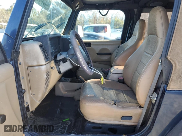 2000 Jeep Wrangler Sport with VIN 1J4FA49S7YP802304, listed as a Copart auction lot 47854795 with 0 mi miles and Salvage Title. Bid and sale history available at carsss.com. Image 7.
