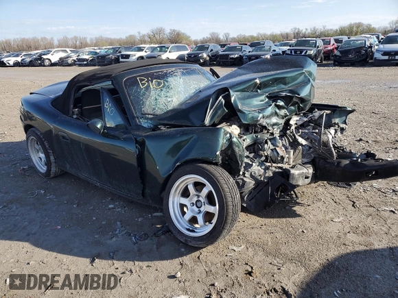 1999 Mazda MX-5 Miata z VIN JM1NB3536X0133733, wystawiony jako Copart lot #50906215 z przebiegiem Nie podano mil oraz Szkoda całkowita • Salvage title. Historia ofert i sprzedaży dostępna na DreamBid. Obrazek 4.
