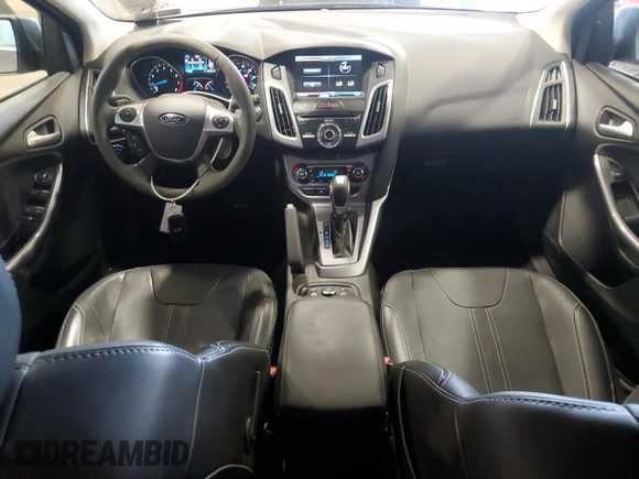 2014 Ford Focus Titanium z VIN 1FADP3N27EL462950, wystawiony jako Copart lot #65207155 z przebiegiem 34 058 mil mil oraz Szkoda całkowita • Salvage title. Historia ofert i sprzedaży dostępna na DreamBid. Obrazek 8.