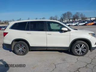 2016 Honda Pilot EX-L with VIN 5FNYF5H5XGB016152, listed as a IAAI auction lot 41820023 with 210,474 mi miles and . Bid and sale history available at DreamBid. Image 14.