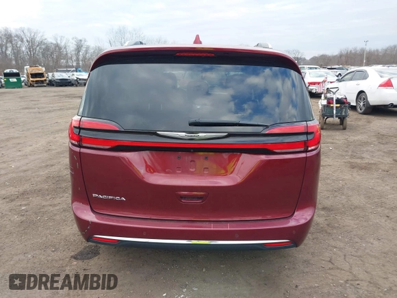 2021 Chrysler Pacifica Touring L with VIN 2C4RC1BG6MR597911, listed as a IAAI auction lot 41660729 with 72,004 mi miles and . Bid and sale history available at DreamBid. Image 16.