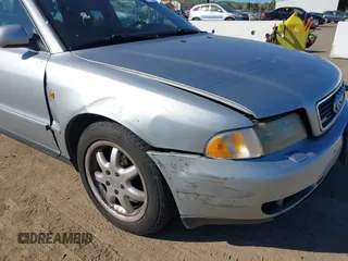 1998 Audi A4 with VIN WAUGD28D5WA235015, listed as a IAAI auction lot 41744703 with 233,432 mi miles. Bid and sale history available at carsss.com. Image 6.