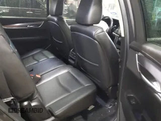 2018 Cadillac XT5 Luxury FWD with VIN 1GYKNCRS8JZ184322, listed as a IAAI auction lot 41225319 with 97,729 mi miles and . Bid and sale history available at carsss.com. Image 8.