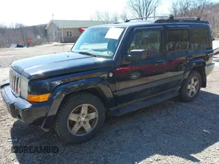 2009 Jeep Commander Sport with VIN 1J8HG48P79C541817, listed as a IAAI auction lot 41906053 with 189,436 mi miles. Bid and sale history available at carsss.com. Image 2.