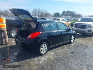 2012 Nissan Versa S with VIN 3N1BC1CP8CK271046, listed as a IAAI auction lot 41318997 with 138,111 mi miles. Bid and sale history available at carsss.com. Image 4.