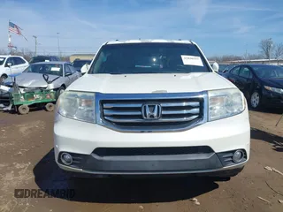 2013 Honda Pilot Touring with VIN 5FNYF3H9XDB006353, listed as a IAAI auction lot 41826557 with 174,552 mi miles and . Bid and sale history available at DreamBid. Image 13.