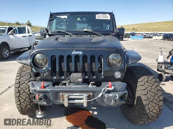 2016 Jeep Wrangler Unlimited Rubicon with VIN 1C4HJWFG3GL155092, listed as a Copart auction lot 62410365 with 82,231 mi miles and Salvage title. Bid and sale history available at DreamBid. Image 5.